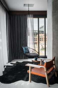 42-inch flat-screen TV with cable channels, TV, pay movies at The Maven Hotel at Dairy Block