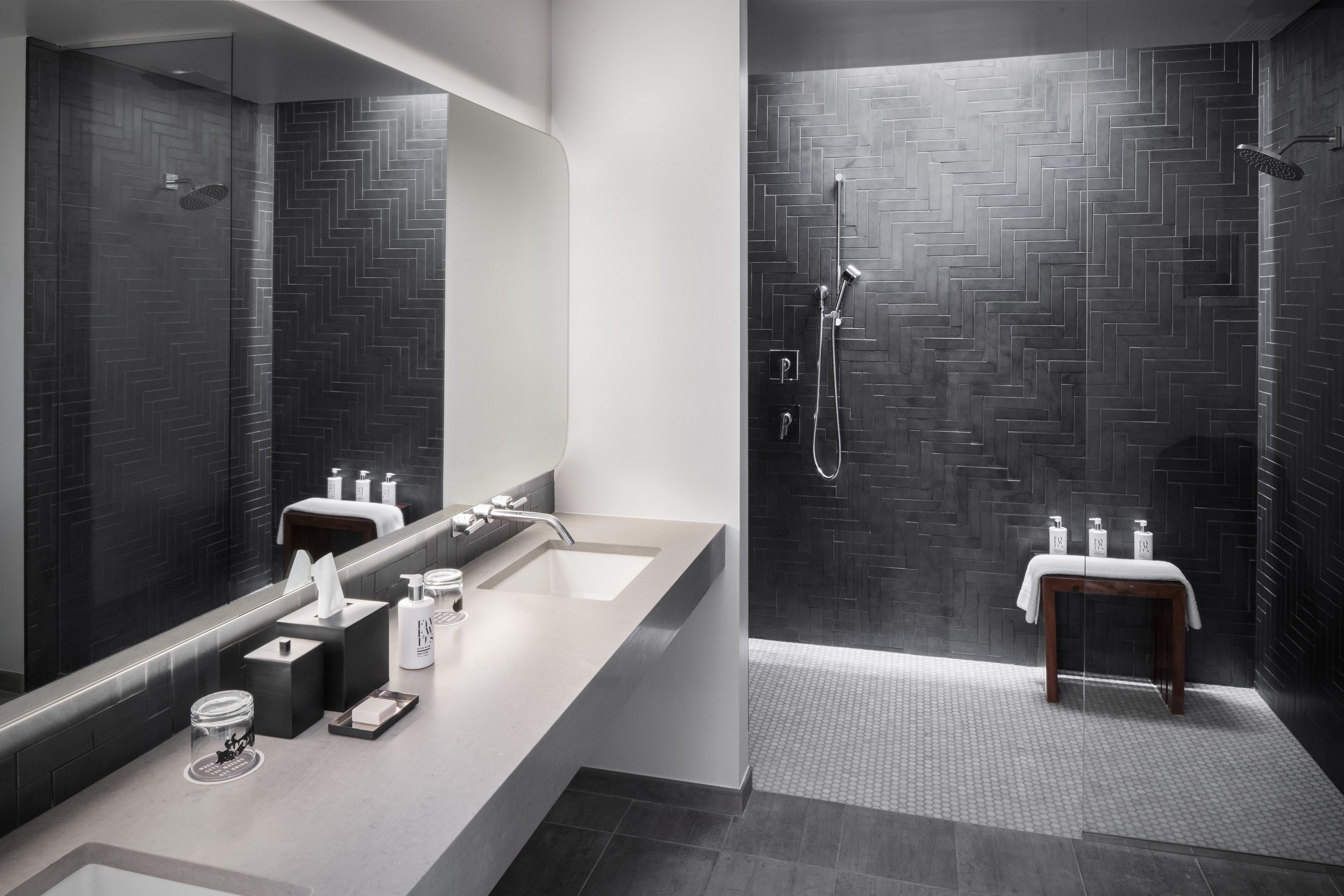 combined shower/bathtub, designer toiletries, bathrobes, towels