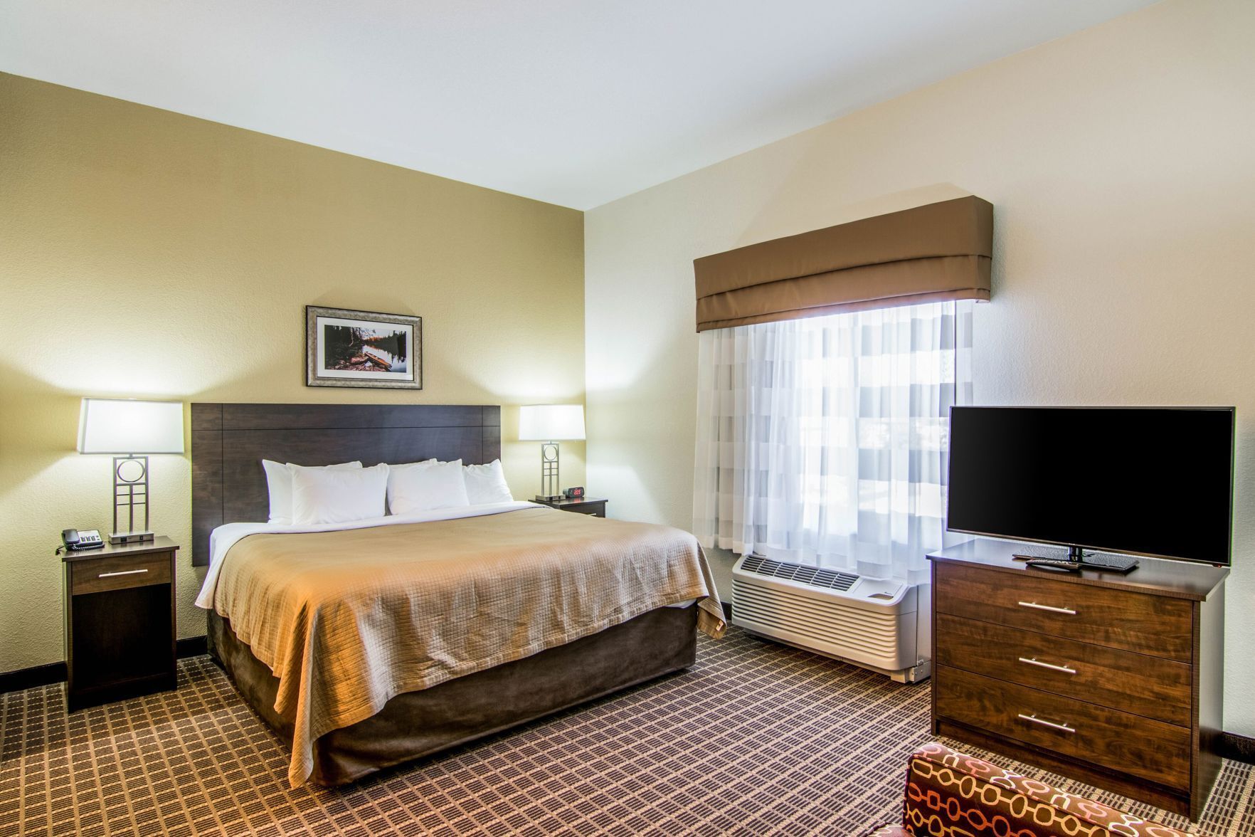Premium bedding, desk, blackout drapes, iron/ironing board