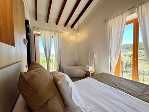 Suite | In-room safe, desk, blackout curtains, soundproofing