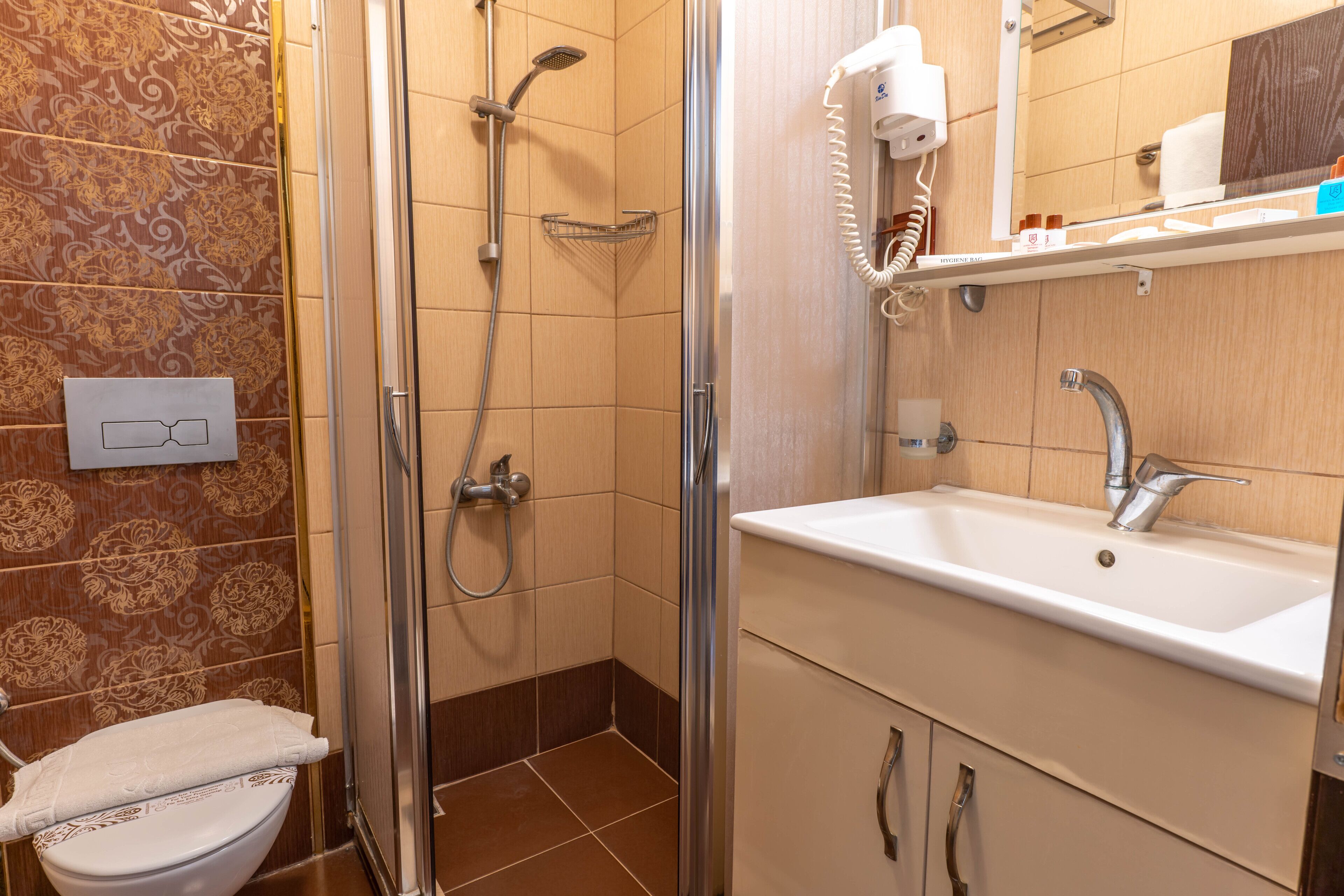 family room, city view | bathroom | shower, free toiletries, hair dryer, slippers