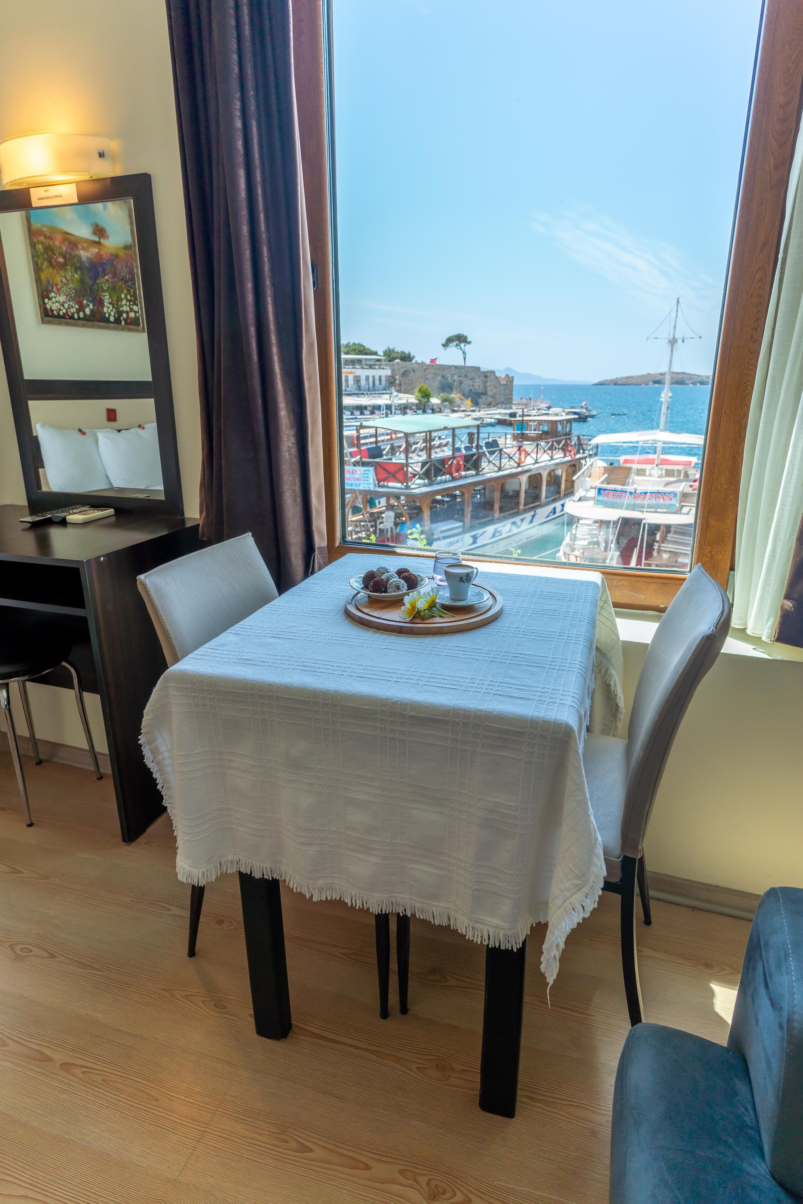 deluxe triple room, sea view | 1 bedroom, in-room safe, desk, iron/ironing board