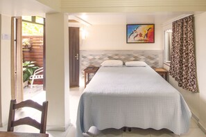 SuĂte standard, Piso tĂ©rreo | 1 quarto, camas com colchĂ”es pillow-top, individualmente decorados