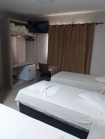 Luxury Triple Room | Minibar, desk, blackout drapes, free WiFi