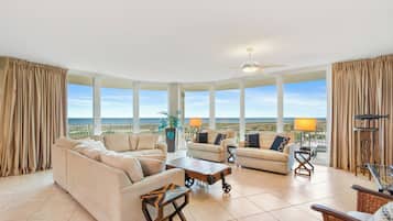 Family Condo, 4 Bedrooms, Balcony, Ocean View | Living room | 65-inch flat-screen TV with cable channels, TV