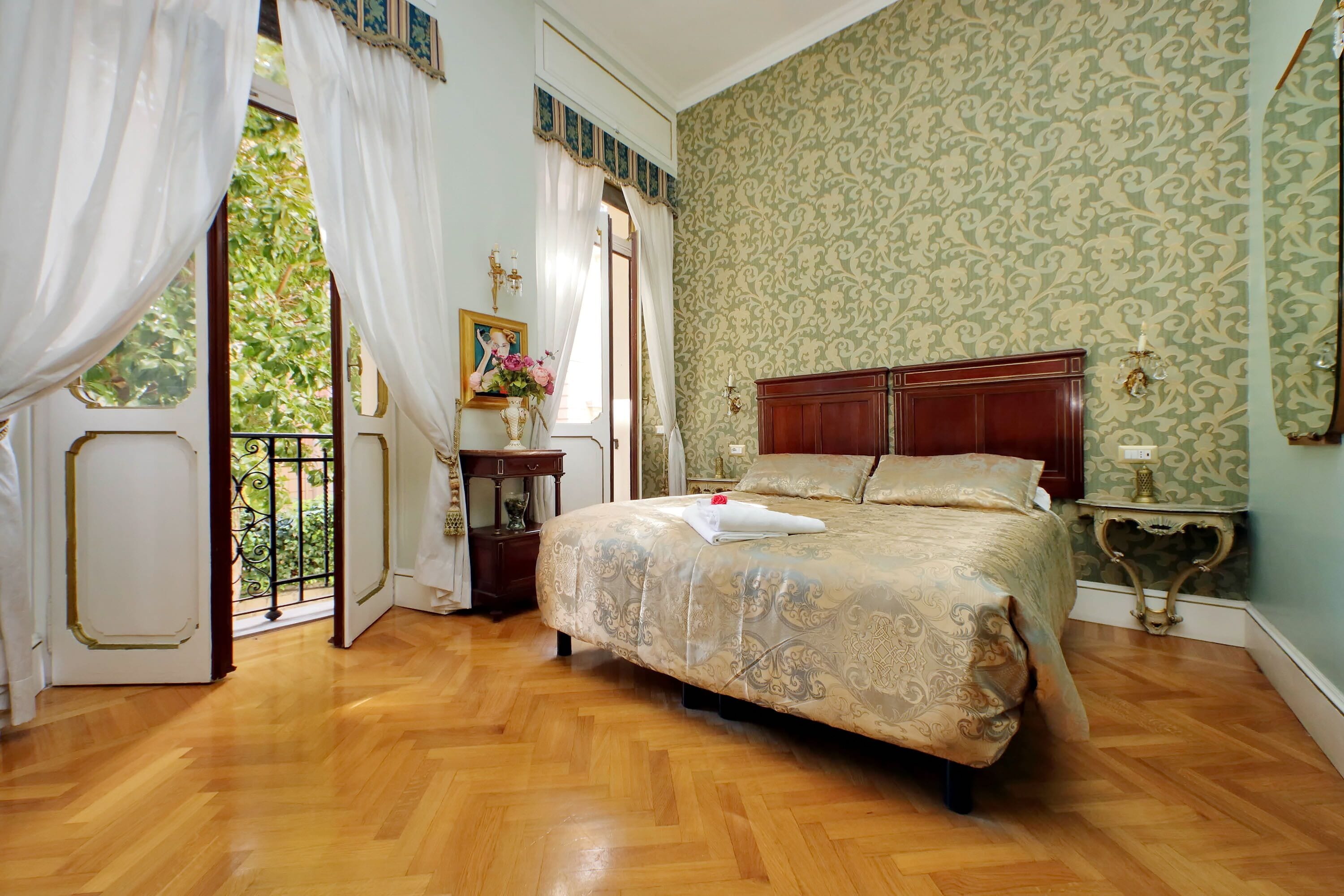 Suite, Garden View, Garden Area (Adriano) | Minibar, in-room safe, desk, iron/ironing board