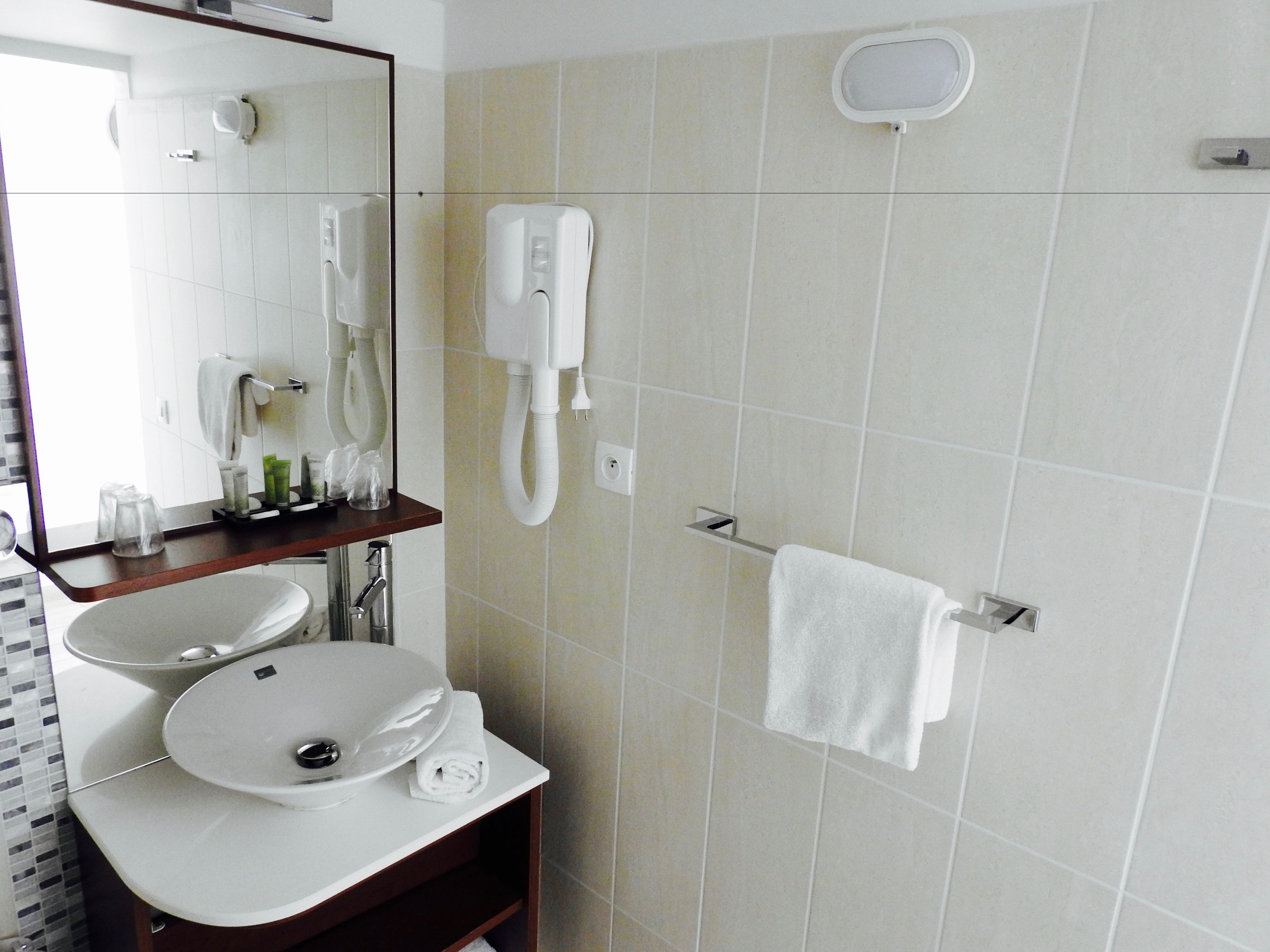 shower, free toiletries, hair dryer, slippers