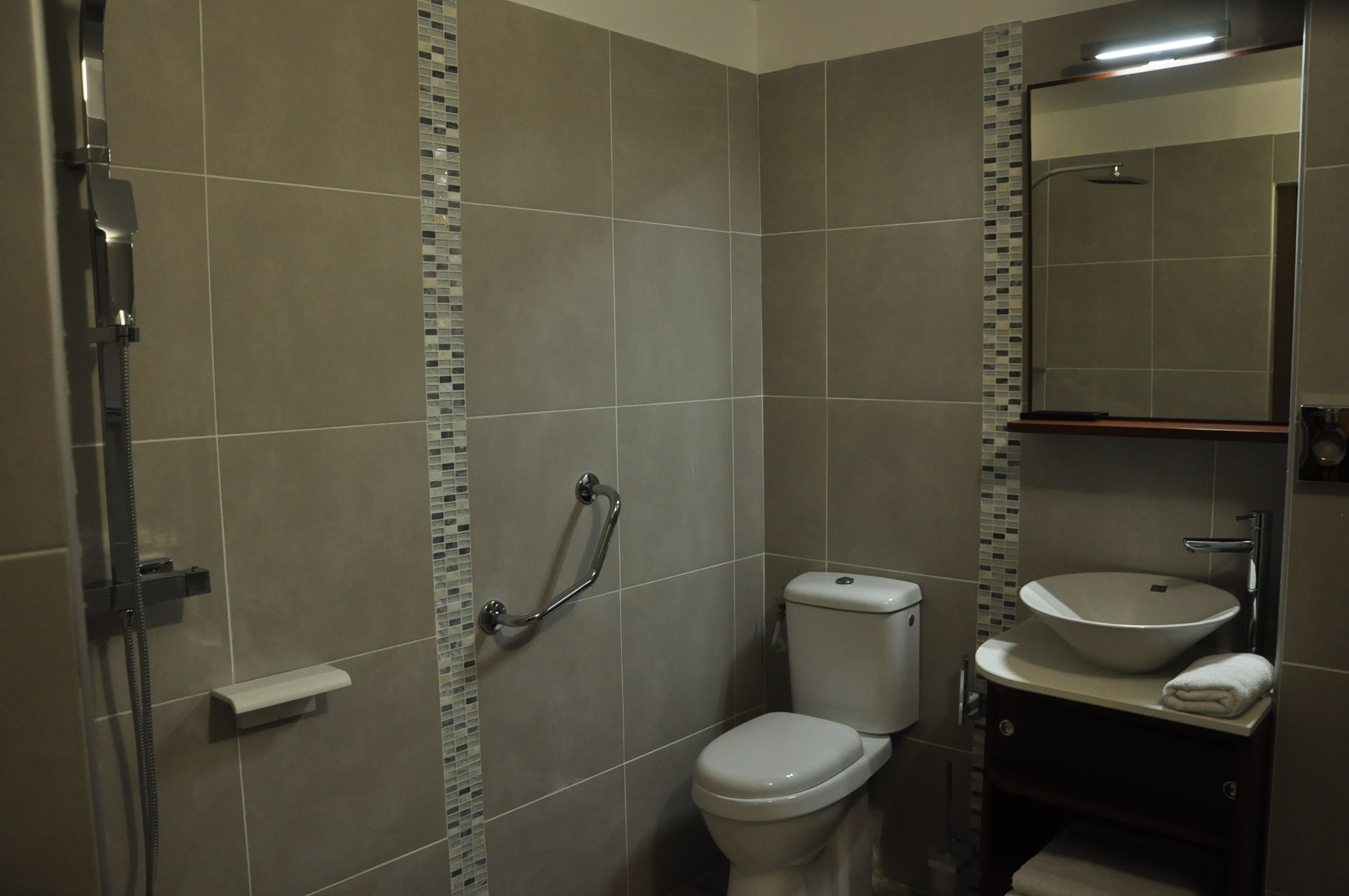 family room | bathroom | shower, free toiletries, hair dryer, slippers