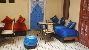 Suite Deluxe, salle de bain privée | Aire de séjour