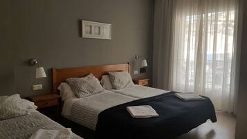 Triple Room | Desk, blackout drapes, soundproofing, cribs/infant beds