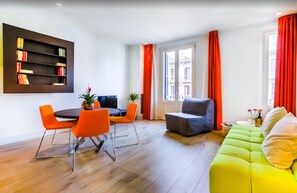 Apartamento, 1 quarto | Sala de estar | TV de tela plana, dock para iPod