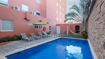 Outdoor pool, open 8:00 AM to 8:00 PM, sun loungers