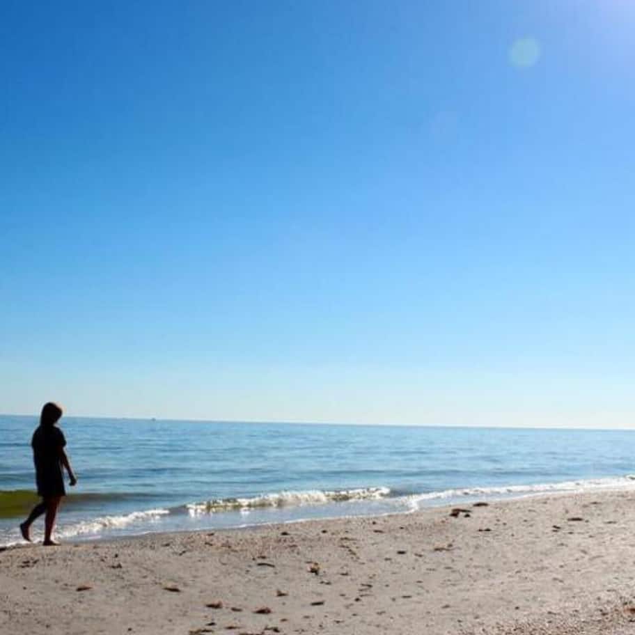 On the beach, sun loungers, beach towels
