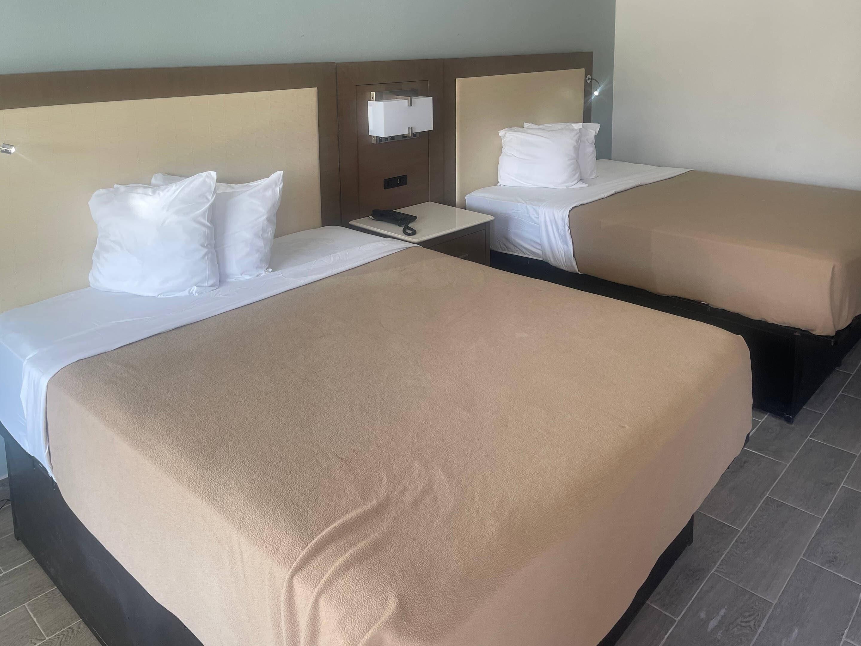 Standard Room, 2 Queen Beds, Non Smoking, Pool View | Iron/ironing board, free WiFi, bed sheets