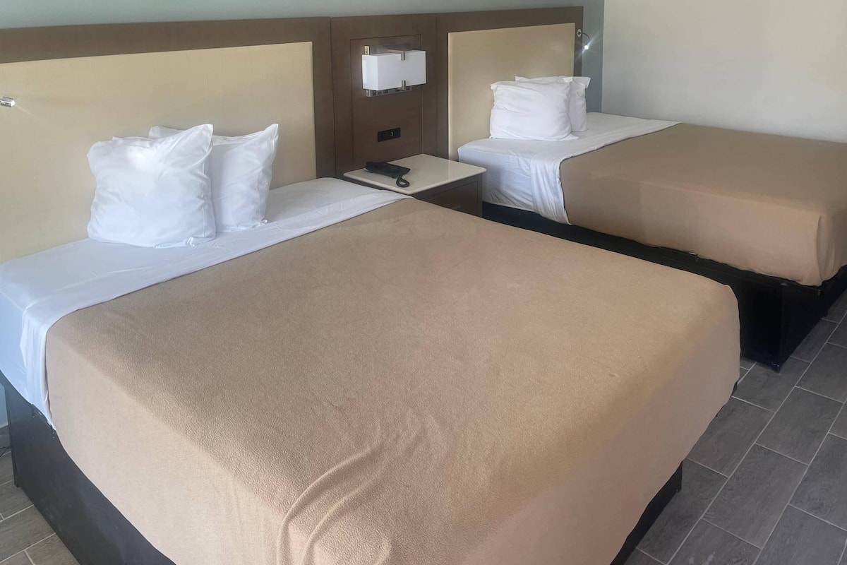 Standard Room, 2 Queen Beds, Non Smoking, Pool View | Iron/ironing board, free WiFi, bed sheets