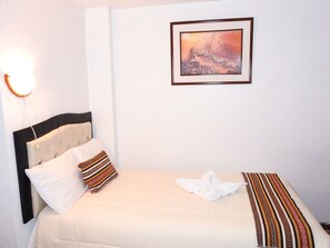 Chambre simple | Coffre-fort, accès au Wi-Fi (inclus)