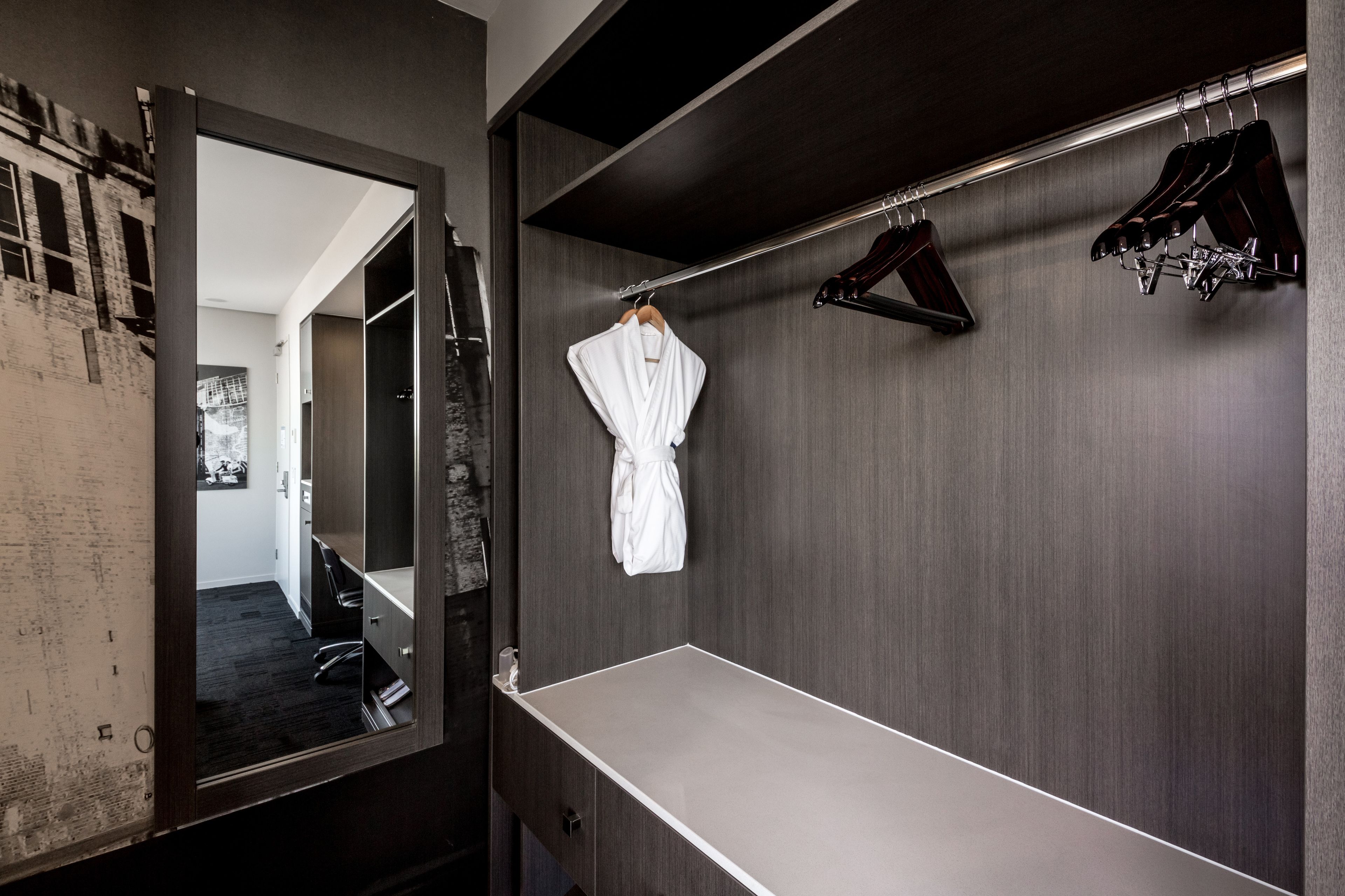 deluxe king city view | in-room safe, desk, laptop workspace, blackout curtains