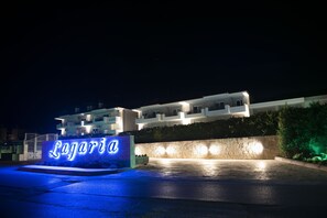 A building with a sign that reads "Lagaria." - Lagaria Apartments (Kassandra)