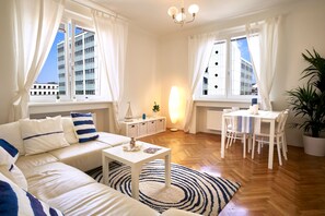 Appartement Confort, 2 chambres, cuisine, en angle (Santorin) | Salle de séjour