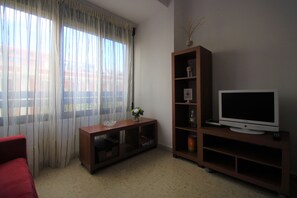 Lägenhet - 3 sovrum - balkong | Vardagsrum | Platt-tv