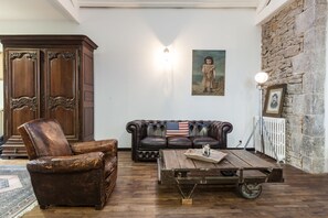 Loft | Zona de estar | Una televisión de pantalla plana