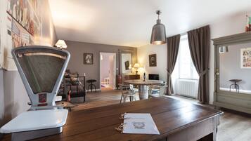 Apartment (L Epicerie) | Living area | Flat-screen TV