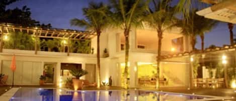 Indoor pool, outdoor pool, pool umbrellas, pool loungers