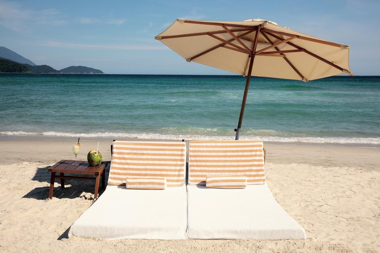 Beach nearby, white sand, sun loungers, beach umbrellas