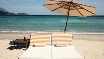 Beach nearby, white sand, sun loungers, beach umbrellas