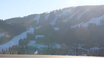 A snowy mountain landscape with a clear sky.