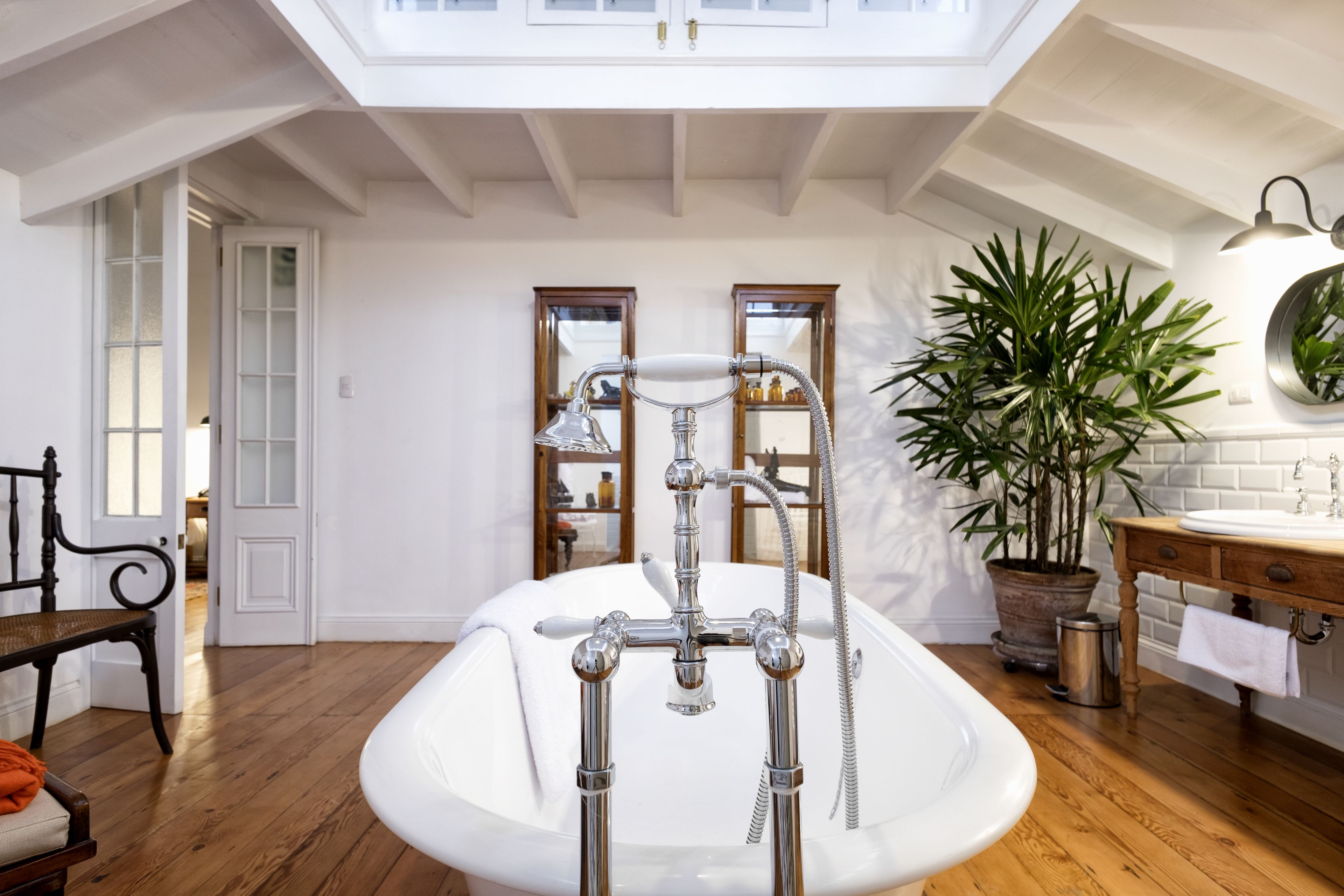 grand suite | bathroom | rainfall showerhead, designer toiletries, hair dryer, bathrobes