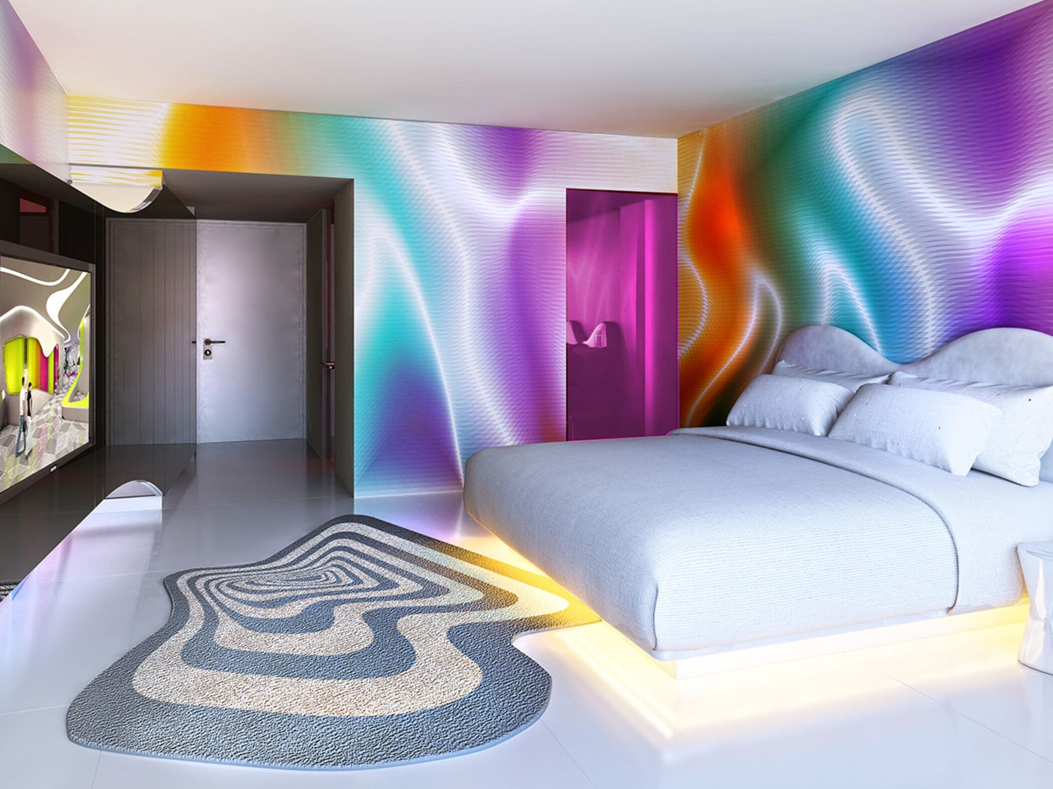 Une chambre moderne avec un lit, une porte et un mur orné d’un motif ondulé.