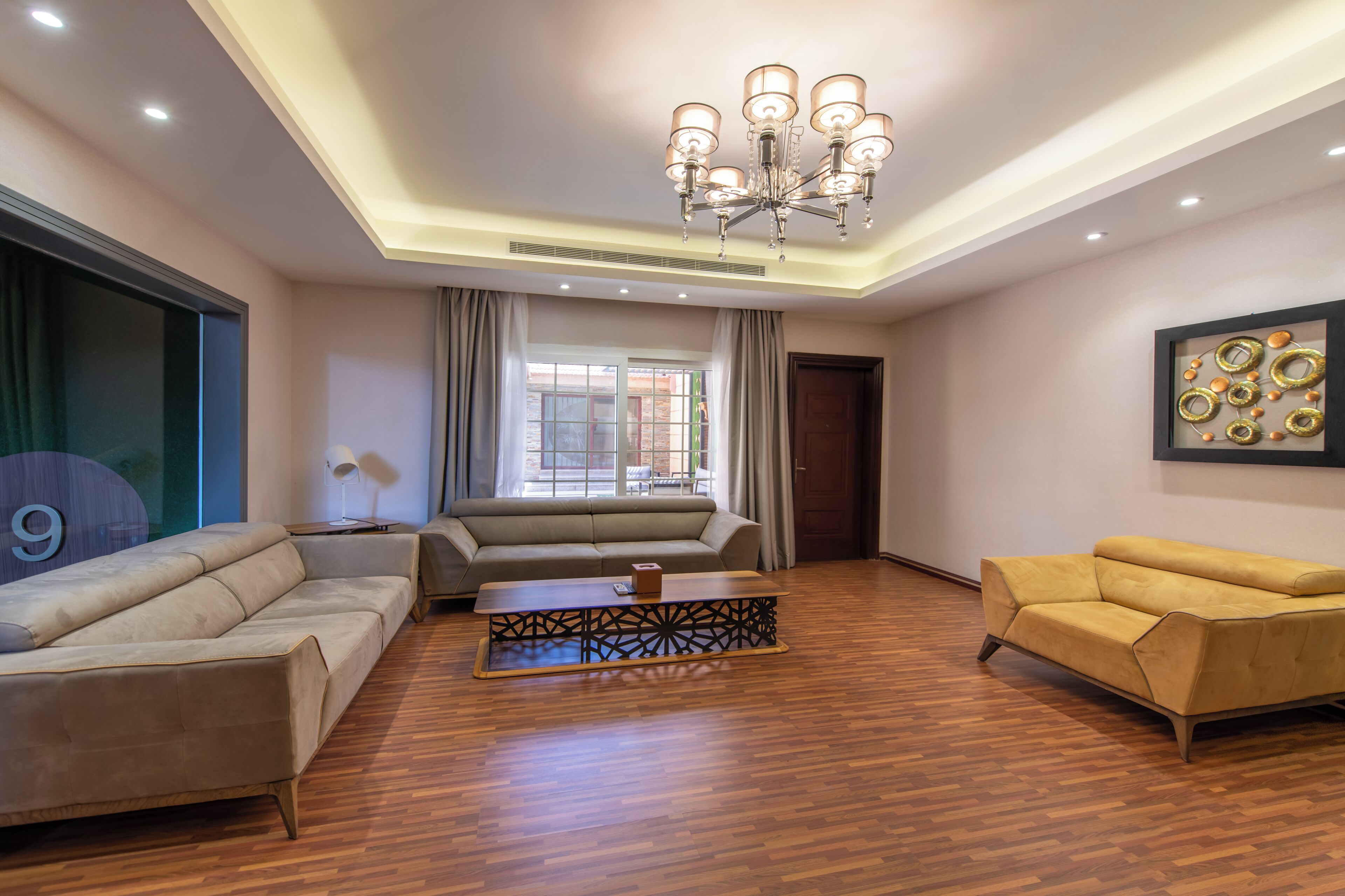 royal villa | living area | 50-inch tv with satellite channels