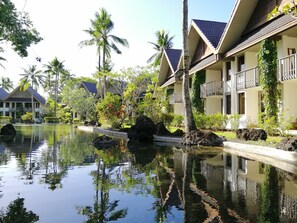 Kamer, uitzicht op tuin | Een minibar, een kluis op de kamer, een bureau, gratis wifi