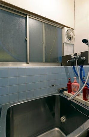 Hair dryer, slippers, towels