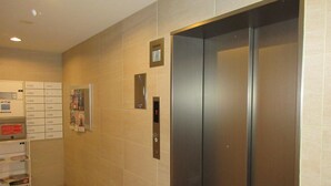 A modern elevator with a control panel and a digital display. - Stella Inn Karasuma Gojo (Kyoto)