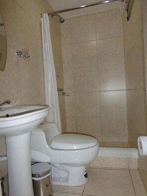 Shower, rainfall showerhead, towels