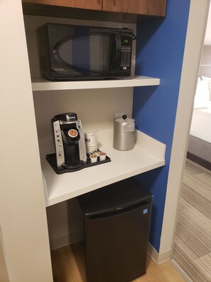 A kitchenette with a microwave, coffee maker, and refrigerator. - Holiday Inn Express & Suites Brigham City - North Utah by IHG (Brigham City)
