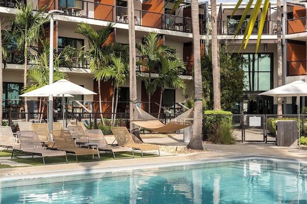 2 outdoor pools, open 8:00 AM to 10:00 PM, pool loungers