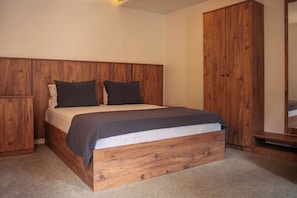 Deluxe Double Room | Minibar, desk, laptop workspace, blackout drapes