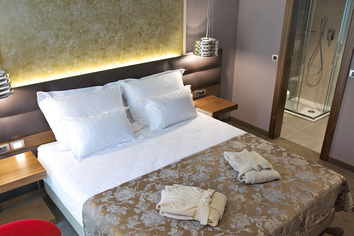 Economy Double Room (French window) | 1 bedroom, minibar, in-room safe, individually decorated