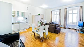 City Apartment, 1 Bedroom, Kitchen | Living area | Flat-screen TV