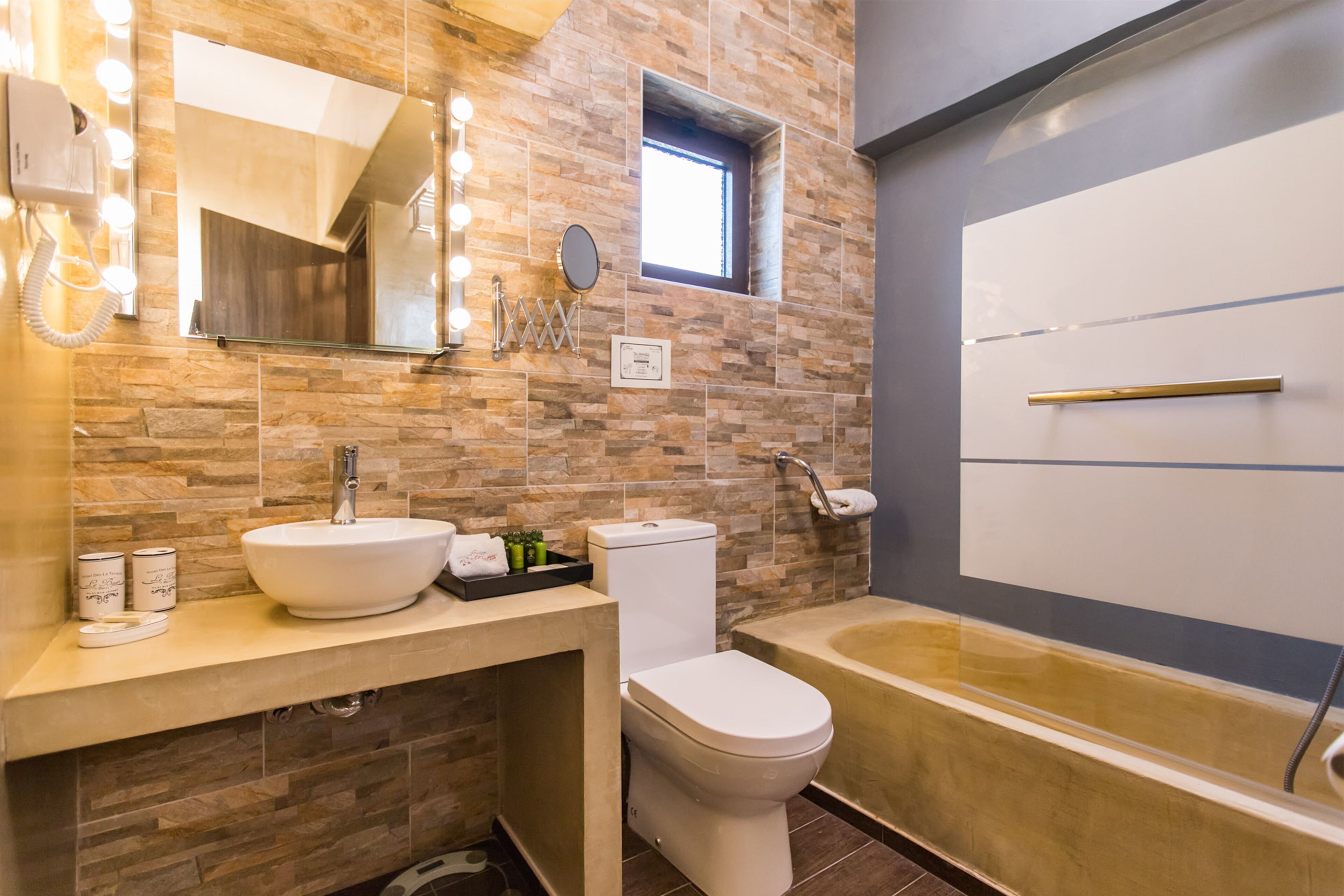 classic room, garden view | bathroom | eco-friendly toiletries, hair dryer, slippers, towels