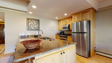 Condo, 2 Bedrooms | Private kitchen | Fridge, microwave, coffee/tea maker