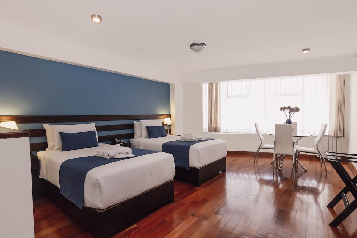 Premium bedding, down comforters, minibar, in-room safe