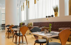 Daily buffet breakfast (USD 23 per person)