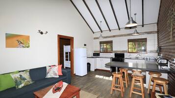 Sunbird Cottage | Private kitchen | Fridge, microwave, oven, stovetop