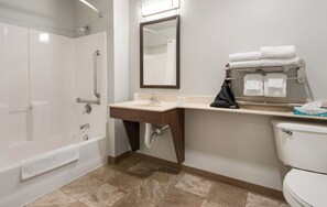 Combined shower/bathtub, hair dryer, towels, soap