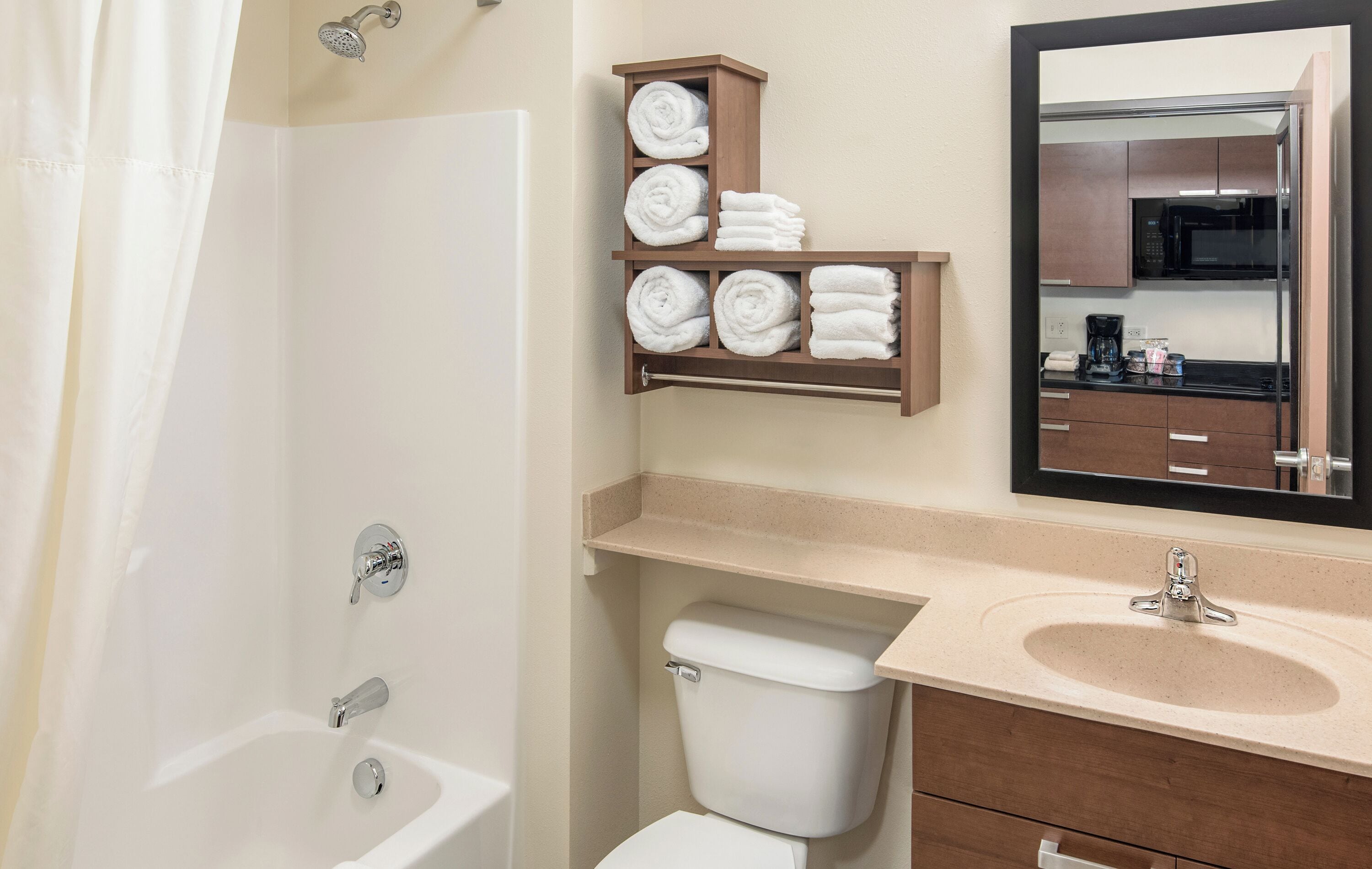 combined shower/bathtub, hair dryer, towels, soap