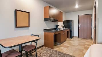 Full-sized fridge, microwave, stovetop, coffee/tea maker